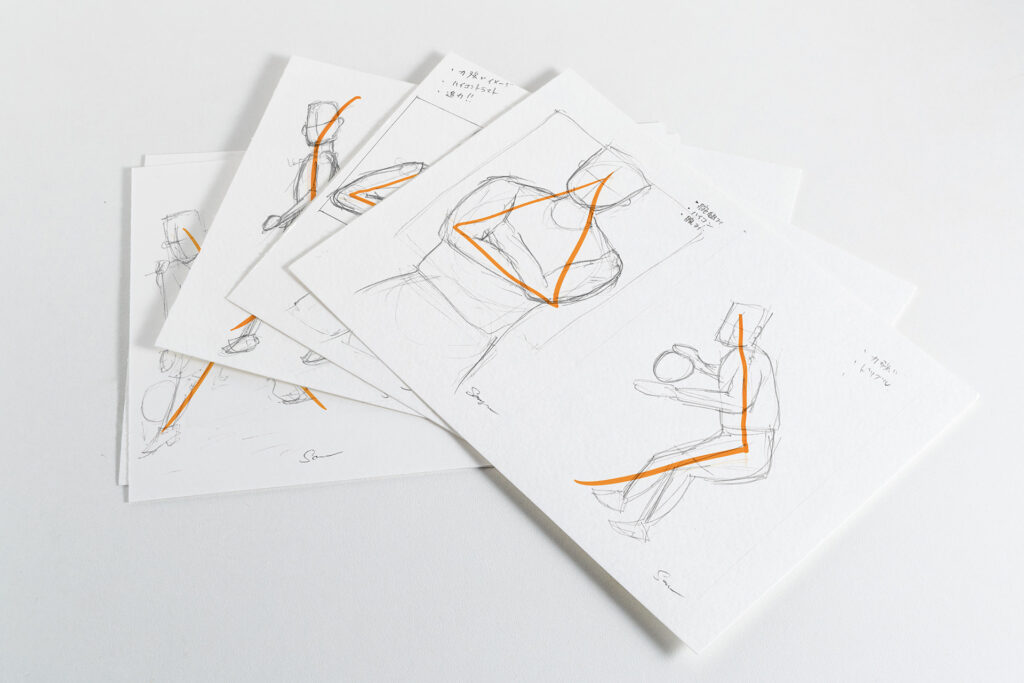 バスケットボール選手の構図案として描かれたラフスケッチ数枚。ポージングの流れを示すオレンジのラインが印象的で、構図設計の意図が読み取れる
